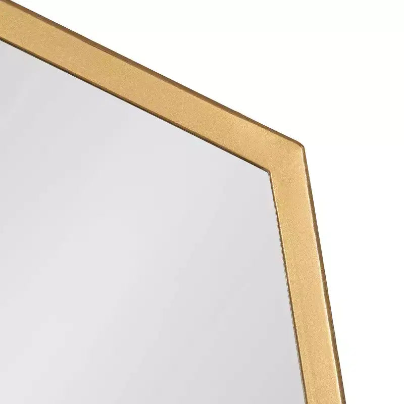 Miroir mural à cadre doré