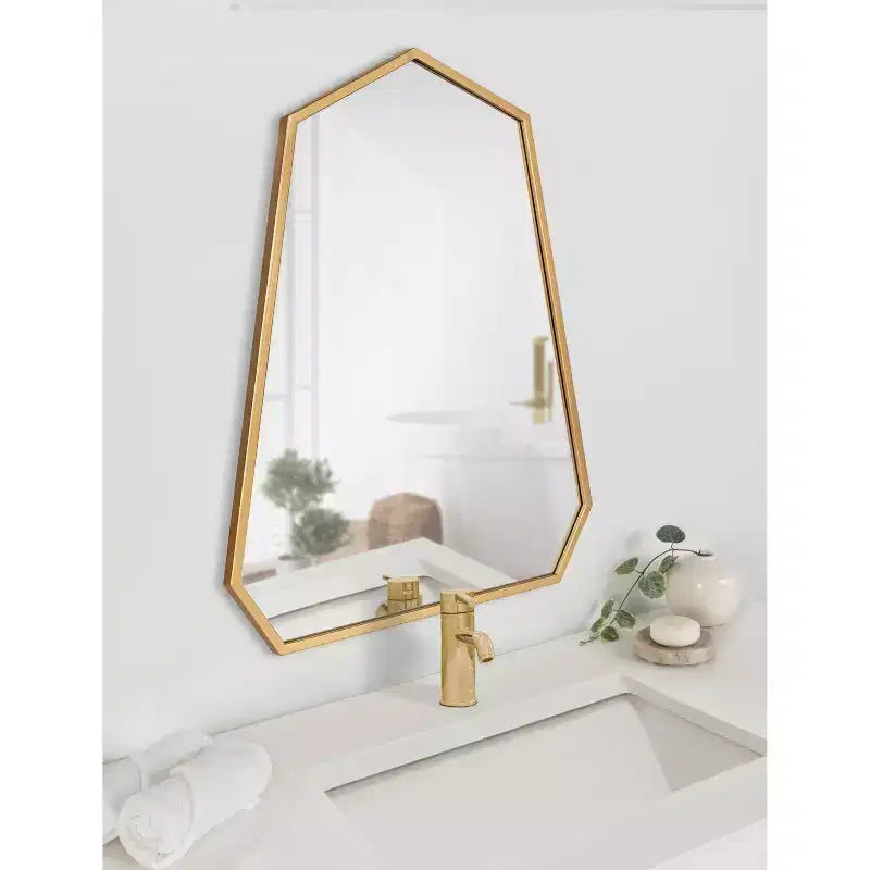 Miroir mural à cadre doré