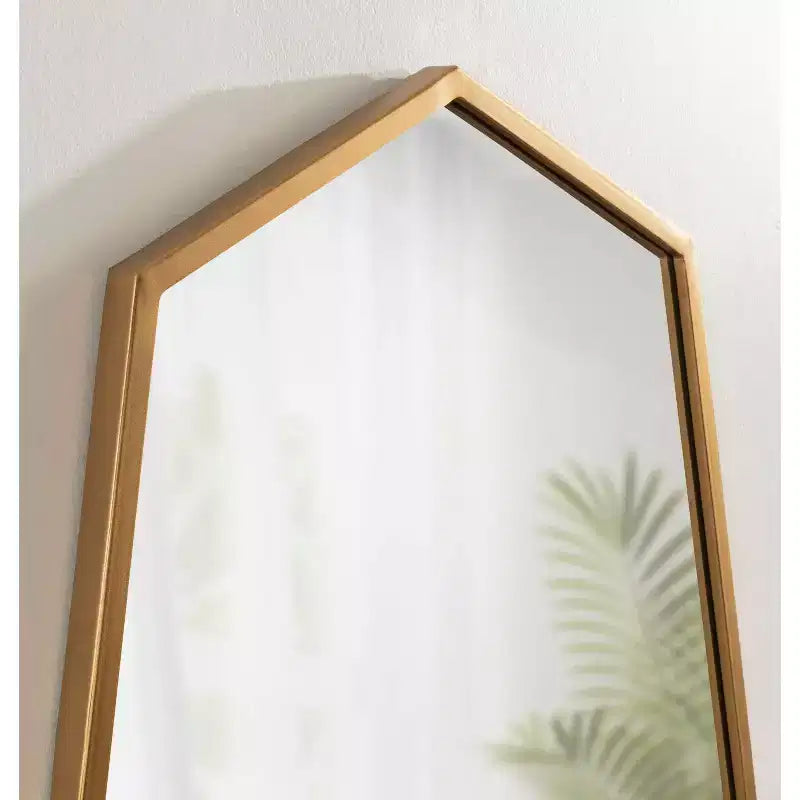 Miroir mural à cadre doré